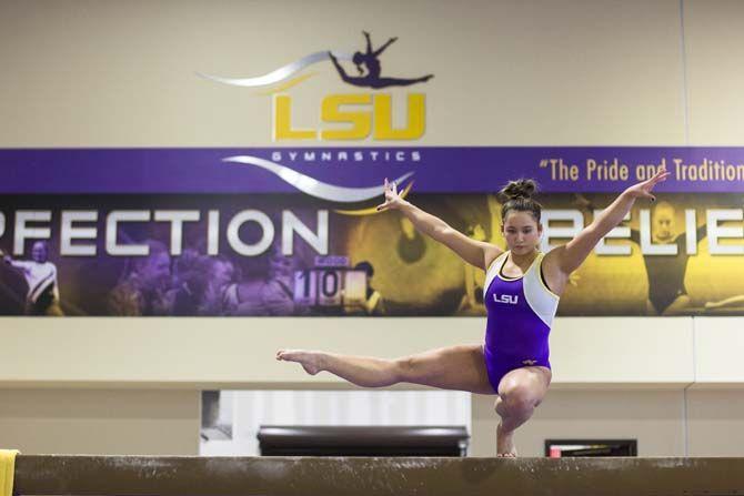 From cartwheels in the basement to nearly quitting, freshman Sarah Finnegan etches her name in gymnastics history