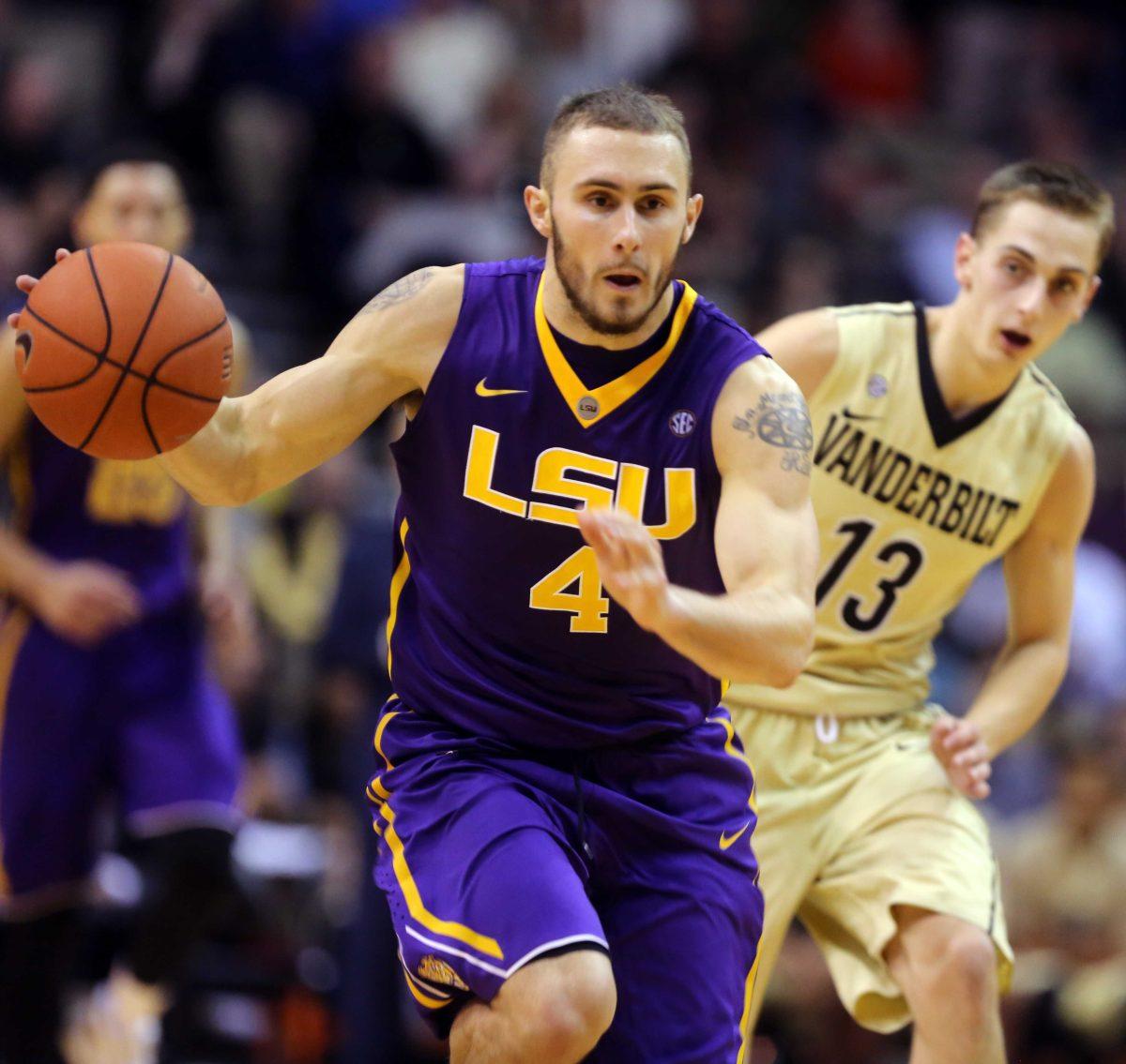 LSU's Keith Hornsby breaks away from Vanderbilt's Riley LaChance (13) during an NCAA college basketball game Saturday, Jan. 2, 2016, in Nashville, Tenn. (Alan Pizner/The Tennessean via AP)