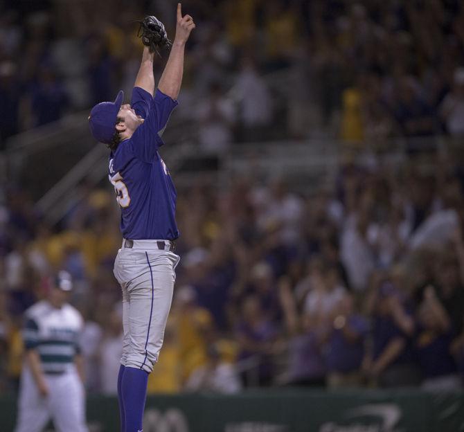 LSU freshman pitcher Alex Lange (35) celebrates earning a complete-game shutout to put the LSU baseball team in the NCAA Regional final, 2-0, over UNC Wilmington on Saturday, May 30, 2015 in Alex Box Stadium.