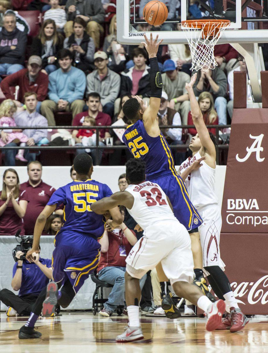 LSU forward Ben Simmons (25) shoots for two over Alabama forward Michael Kessens (3) as LSU guard Tim Quarterman (55) and Alabama guard Retin Obasohan (32) battle underneath during an NCAA college basketball game, Saturday, Jan. 23, 2016, at Coleman Coliseum in Tuscaloosa, Ala. (Vasha Hunt/AL.com via AP) MAGS OUT; MANDATORY CREDIT