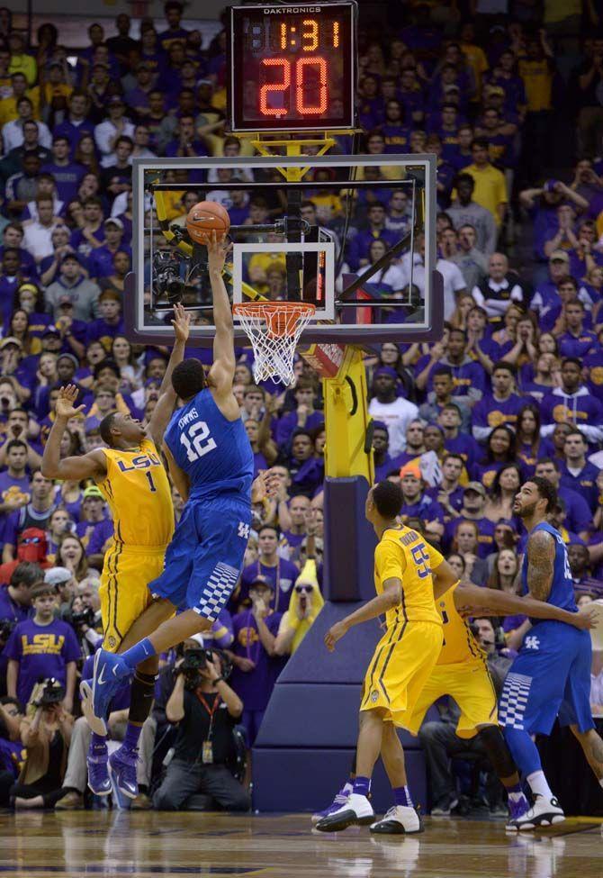 Kentucky freshman forward Karl-Anthony Towns (12) dunks the ball during the Tigers' 71-69 loss on Tuesday, February, 10, 2015 in the Pete Maravich Assembly Center.