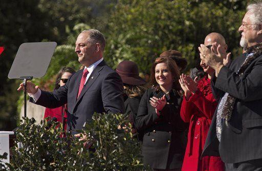 John&#160;Bel&#160;Edwards&#160;waves to the crowd after takinf the oath of office as Louisiana governor on the steps of the Louisiana Capitol in Baton Rouge, La., Monday, Jan. 11, 2016.&#160;Edwards&#160;is Louisiana's 56th governor.&#160;(AP Photo/Max Becherer, Pool)