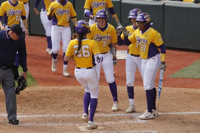 LSU junior outfield Bailey Landry (26) celebrates with her teammates during the Tigers' 5-3 victory against Texas Tech on Sunday February 28, 2016 at Tiger Park.