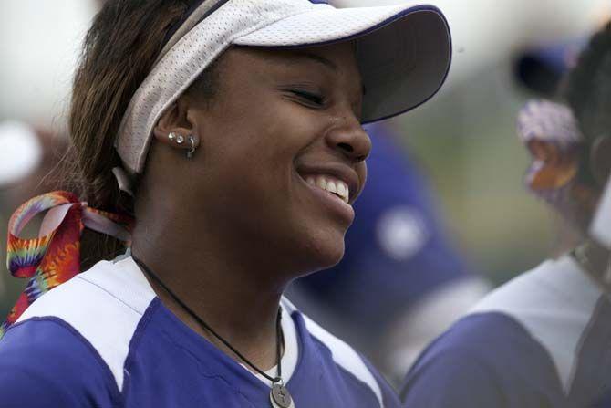 LSU junior infield Bianka Bell (27) celebrates after getting three outs during the Tigers' 10-2 victory against Oklahoma Saturday, March 21, 2015 in Tiger Park.