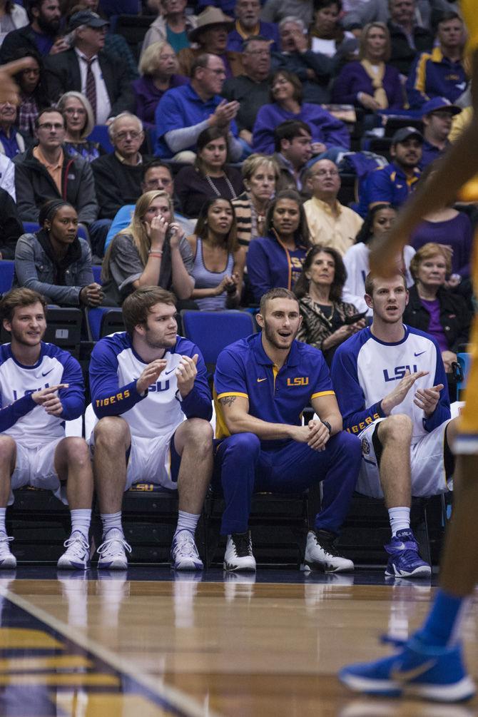 LSU senior guard Keith Hornsby (4) cheers from the sidelines during LSU's 81-70 victory over McNeese State University on Friday, Nov. 13, 2015 in the Pete Maravich Assembly Center.