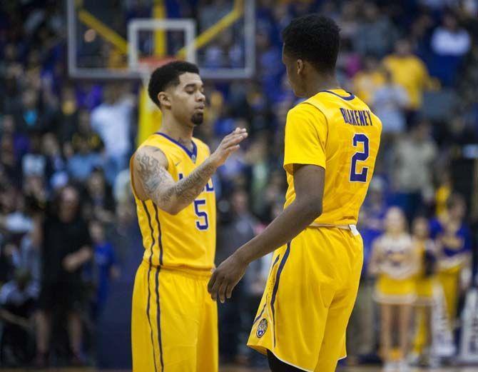 LSU senior guard Josh Gray (5) shakes hands with freshman guard Antonio Blakeney (2) after Blakeney&#8217;s successful free throw during the LSU 96-91 victory against the Florida on Saturday, Feb. 27 in the PMAC.