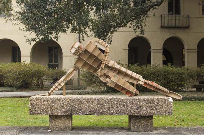 Architecture students create life-size, gameday-themed figures using recycled cardboard