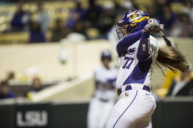 LSU senior catcher Kellsi Kloss (77) swings at the ball Wednesday, Feb. 24, 2016, during the Tigers' 5-0 victory against South Alabama in Tiger Park.