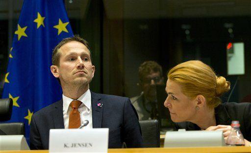 Danish Foreign Minister Kristian Jensen, left, and Danish Minister for Immigration Inger Stojberg attend a meeting of the Civil Liberties Committee at the European Parliament in Brussels on Monday, Jan. 25, 2016. Members of Parliament will debate on Monday the Danish law on asylum and refugees. (AP Photo/Virginia Mayo)