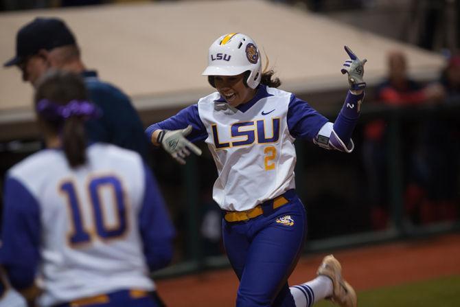 LSU junior infielder Sahvanna Jaquish (2) celebrating the teams run during their 2-1 defeat on Saturday, Feb. 13, 2016 at Tiger Park