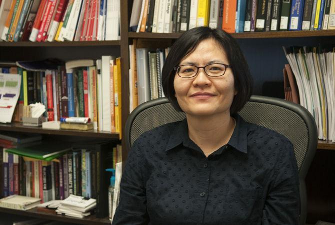 Assistant Professor Sunyoung Park, pictured in her Coates Hall office Tuesday, Feb. 16, 2016, conducts research on human resource development, including the positive effects of a team-oriented workplace.