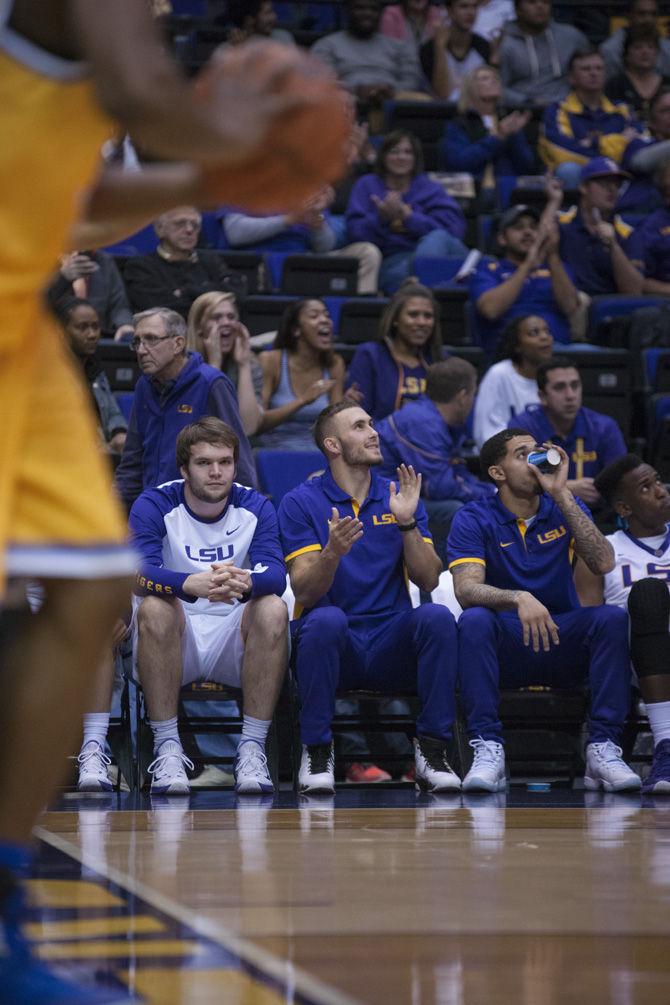 LSU senior guard Keith Hornsby (4) cheers on his teammates from the sidelines during LSU's 81-70 victory over McNeese State University on Friday, Nov. 13, 2015 in the Pete Maravich Assembly Center.