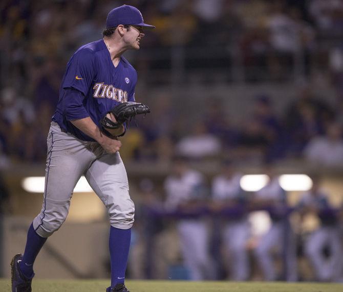 LSU freshman pitcher Alex Lange (35) celebrates after retiring the side to end the sixth inning during the Tiger's 2-0 victory against UNC Wilmington in the NCAA Regionals on Saturday, May 30, 2015 in Alex Box Stadium.