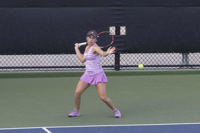 LSU senior Ella Taylor returns the ball against North Carolina State on Friday, February 12, 2016 at the LSU Tennis Complex.