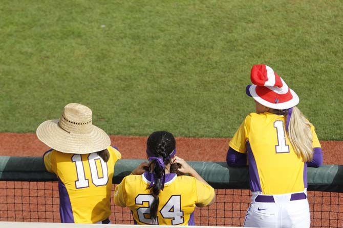 LSU players wear funny hats during the Tigers' 5-3 victory against Texas Tech on Sunday February 28, 2016 at Tiger Park.