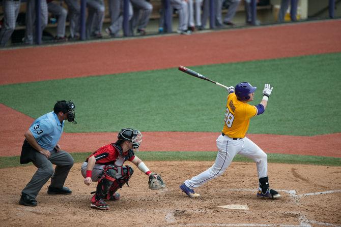 LSU junior catcher Jordan Romero (28) bats during the Tiger's 12-4 victory against The University of Cincinnati on Sunday, Feb. 21, 2016 at the Alex Box Stadium