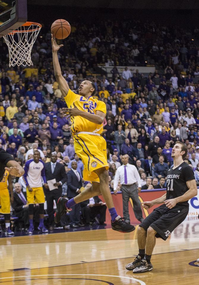 LSU junior guard Tim Quarterman (55) makes a lay up during the Tigers' 76-71 victory against Texas A&amp;M on Saturday, Feb. 13, 2016 in the PMAC.