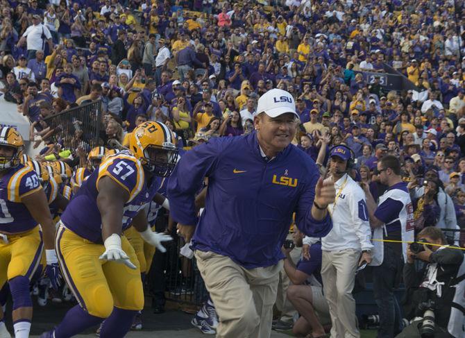 LSU head coach Les Miles rushed the field prior the Tigers&#8217; 44-22 victory against Eastern Michigan on Saturday, Oct. 03, 2015 in Tiger Stadium.