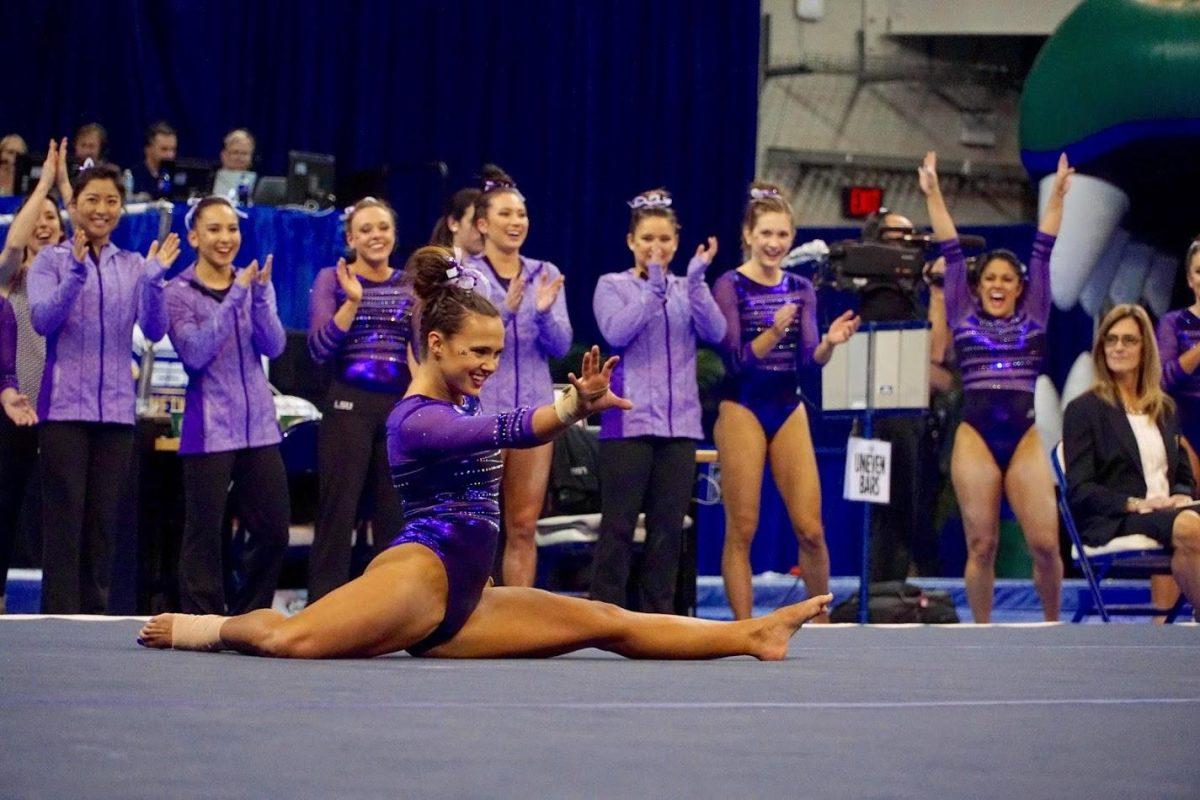 Ashleigh Gnat nails a 9.950 floor routine and finishes by striking a Tiger claw pose on Friday night in the O'Connell Center.