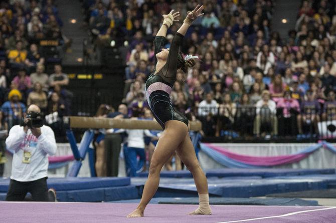 LSU all-around junior Ashleigh Gnat performs a floor routine during the Tigers' 196.575-195.100 victory against Kentucky for the Pink &amp; Blue Meet on Friday, Jan. 22, 2016 in the PMAC.