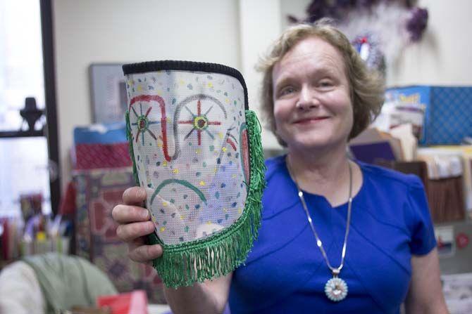 Associate Professor of folklore and English, Carolyn Ware, displays her extensive collection of traditional Mardi Gras masks on Tuesday, February 02, 2016 at Allen Hall.