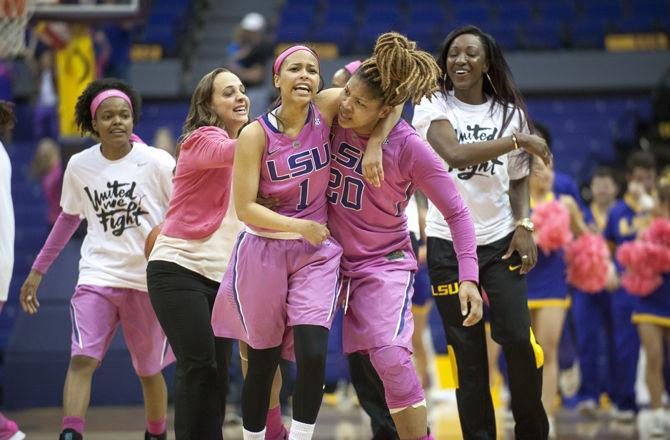 LSU sophomore guard Jenna Deemer (1) and junior forward Alexis Hyder (20) celebrate on Sunday, Feb. 21, 2016 after the Lady Tigers' 57-56 victory against Tennessee in the PMAC.