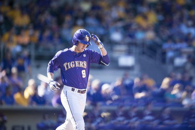 LSU freshman infielder O'Neal Lochridge (9) runs towards first base on Saturday, March 5, 2016, during the Tigers' 15-1 win against Fordham at Alex Box Stadium.