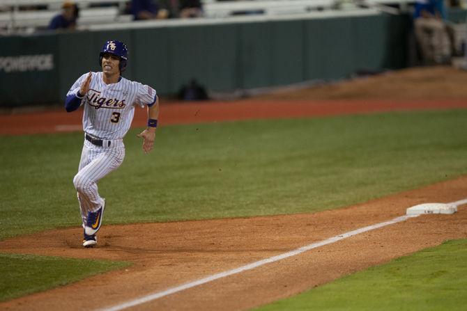 LSU junior infielder Kramer Robertson (3) runs to home plate during LSU's 6-3 win against Louisiana Tech on Tuesday, March 8, 2016 at Alex Box Stadium