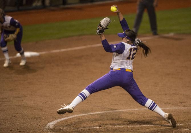 LSU freshman pitcher Sydney Smith (12) pitches during the Tigers' 8-0 victory against ULM on Tuesday, Mar. 1, 2016 in Tiger Park.