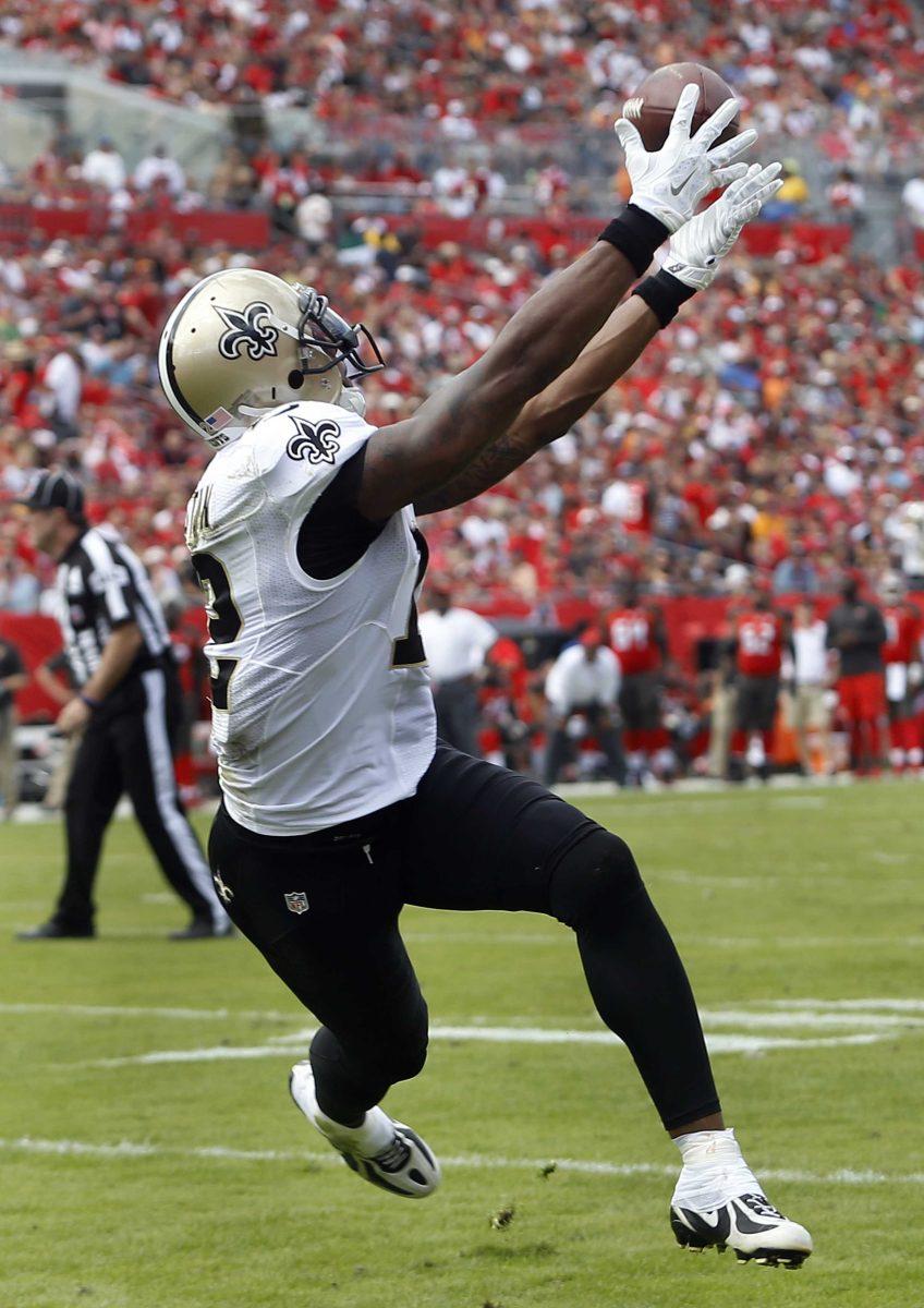 FILE - In this Dec. 13, 2015, file photo, New Orleans Saints wide receiver Marques Colston (12) catches a 1-yard touchdown reception against the Tampa Bay Buccaneers during the second quarter of an NFL football game, in Tampa, Fla. Saints all-time leading receiver Marques Colston has been informed he'll be released by the only NFL club for which he has played during his 10-year pro career, said a person familiar with the decision says The person spoke to The Associated Press Wednesday, Feb. 24, 2016, on condition of anonymity because the move, which was first reported by ESPN, has not been announced or made official with the league office. (AP Photo/Brian Blanco, File)