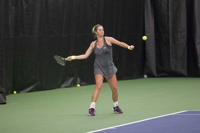 Sophomore, Ryann Foster, returns the ball against Ole Miss on Friday, March 11, 2016 at the LSU Tennis Complex.