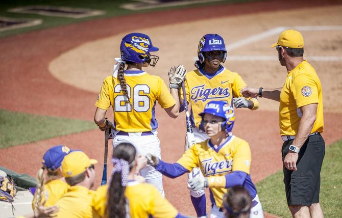 LSU outfielder junior Bailey Landry (26) congratulates junior indfielder Constance Quinn (5) during the Tigers' 16-0 victory against Tennessee Tech in five innings on Sunday, Mar. 6, 2016 in Tiger Park.