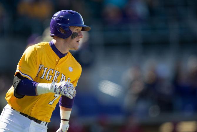 LSU sophmore infielder Greg Deichmann (7) runs to first base during LSU's 7-5 victory against the University of Alabama on Sunday, March 20, 2016 at Aleb Box Stadium