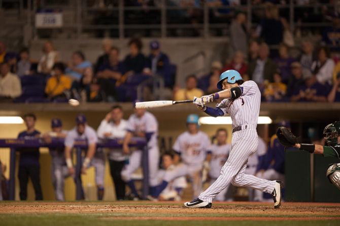 LSU junior infielder Kramer Robertson (3) bats during LSU's 7-1 defeat against Tulane University on Tuesday, March 29, 2016 at Alex Box Stadium