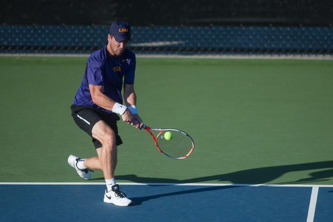 LSU junior Jordan Daigle returning the ball during LSU's victory against Drake on Friday, Feb. 19 2016 at the LSU Tennis Facility