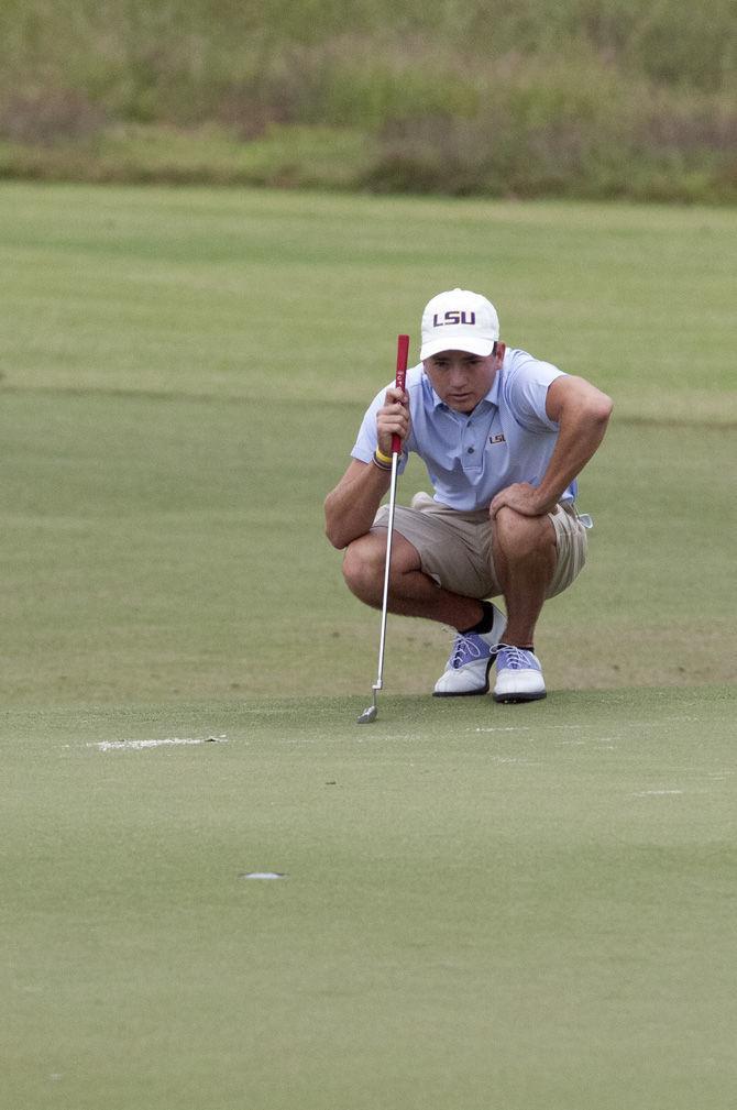 LSU senior golfer Zach Wright reads the green during the David Toms Intercollegiate tournament on Oct. 11, 2015, at the University Club golf course.