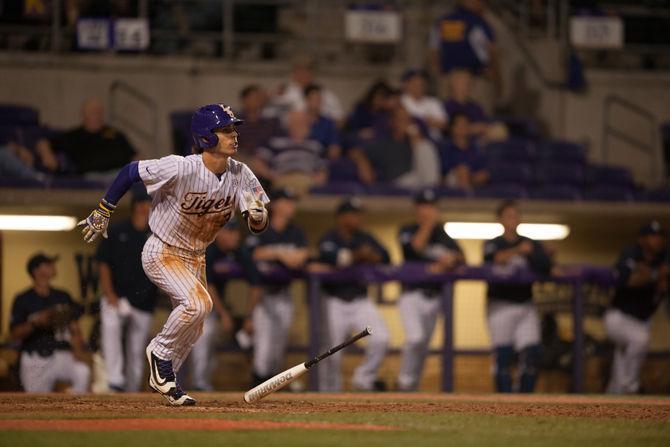 LSU junior infielder Kramer Robertson (3) runs to first base during LSU's 9-4 victory against the University of New Orleans on Wednesday, March 16, 2016