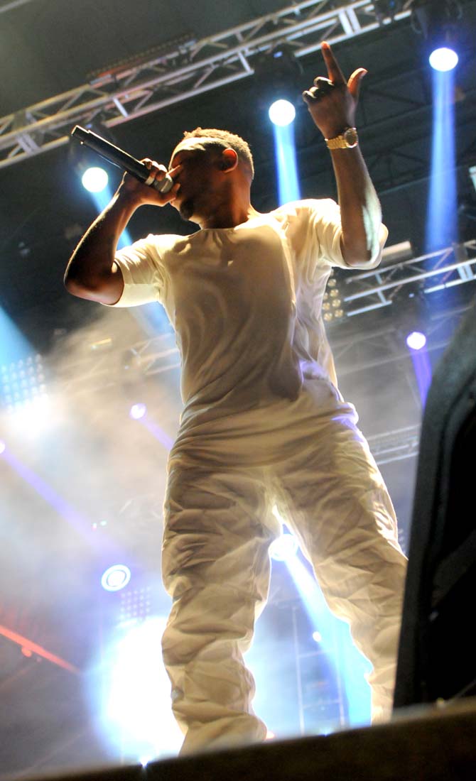 Kendrick Lamar Duckworth, simply known as Kendrick Lamar, performs near the front of the stage Saturday, March 9, 2013 at the Buku Music and Arts Project in New Orleans.