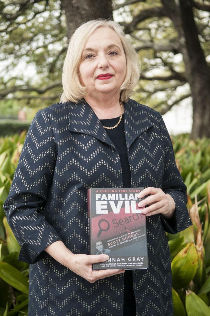 Author Rannah Gray displays her book "Familiar Evil" Wednesday, March 16, 2016, in downtown Baton Rouge.