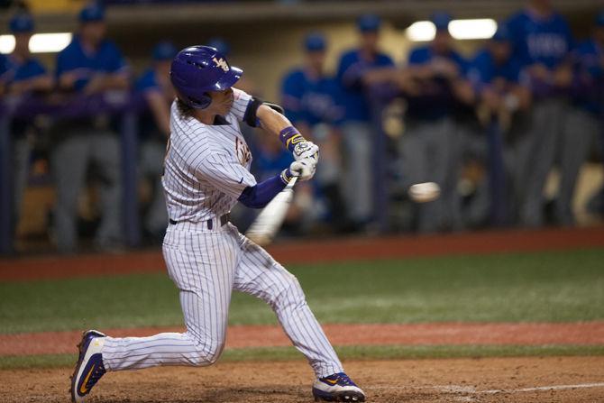 LSU junior infielder Kramer Robertson (3) bats during LSU's 6-3 win against Louisiana Tech on Tuesday, March 8, 2016 at Alex Box Stadium