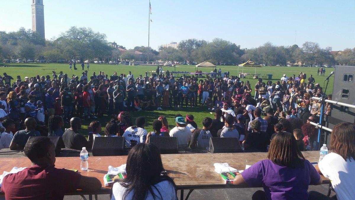 Students gather on the LSU Parade Ground for the last event of Black History Month at LSU.