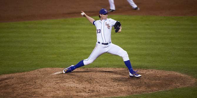 LSU freshman pitcher Cole McKay (33) winds up for the pitch during LSU's 12-1 win against Fordham in Alex Box Stadium on Friday March 4, 2016.