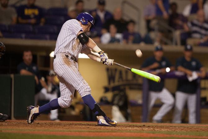 LSU sophmore infielder Greg Deichmann (7) bats during LSU's 9-4 victory against the University of New Orleans on Wednesday, March 16, 2016