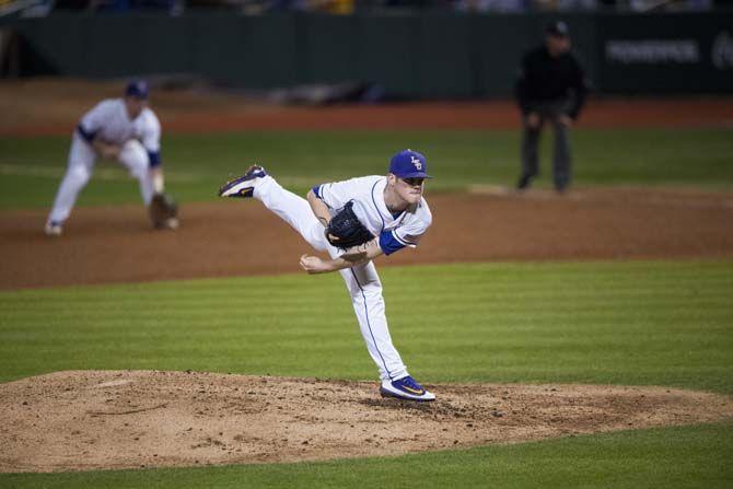 LSU junior pitcher Jared Poche&#8217; (16) releases the pitch sending it to home plate during LSU's 12-1 win against Fordham in Alex Box Stadium on Friday March 4, 2016.