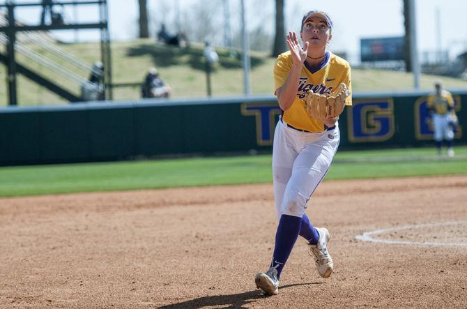 LSU sophomore pitcher Carley Hoover (21) catches the ball during her first career no-hitter in the Tigers' 16-0 victory against Tennessee Tech in five innings on Sunday, Mar. 6, 2016 in Tiger Park.