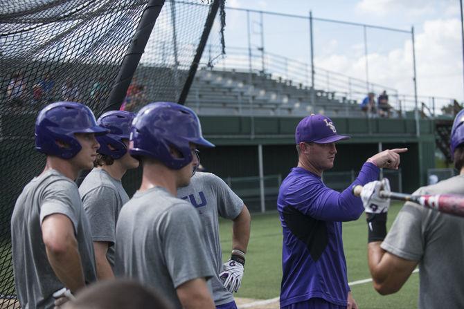 LSU hitting coach Andy Cannizaro instructs his players during the Tigers' forth practice at the NCAA College World Series on Wednesday, June 17, 2015 in Creighton University Sports Complex.