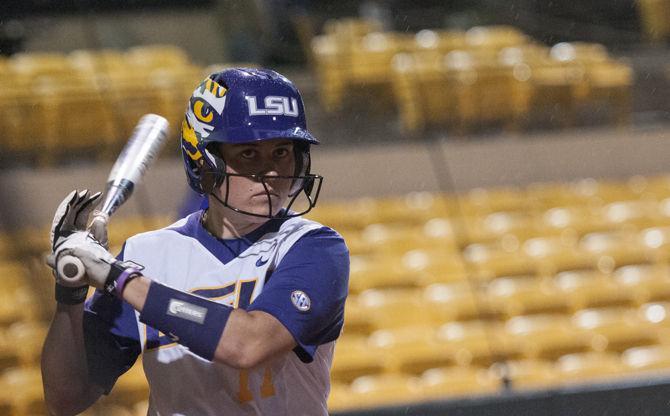 LSU seinor catcher Kellsi Kloss (77) stretches during game two of the Tigers' 1-0 victory against Longwood University on Tuesday, Mar. 8, 2016 in Tiger Park.