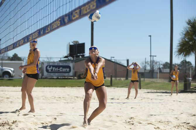 LSU freshman Ashley Allmer (11) digs the ball during the beach volleyball Purple &amp; Gold scrimmage on Saturday, Feb. 27, 2016 at Mango's Beach Volleyball Club in Baton Rouge.