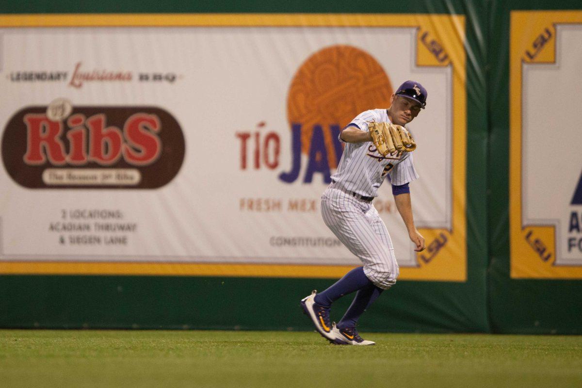 LSU freshman outfielder Antoine Duplantis (20) catches a pop fly during LSU's 7-0 defeat on Tuesday, April 12, 2016 at Alex Box Stadium