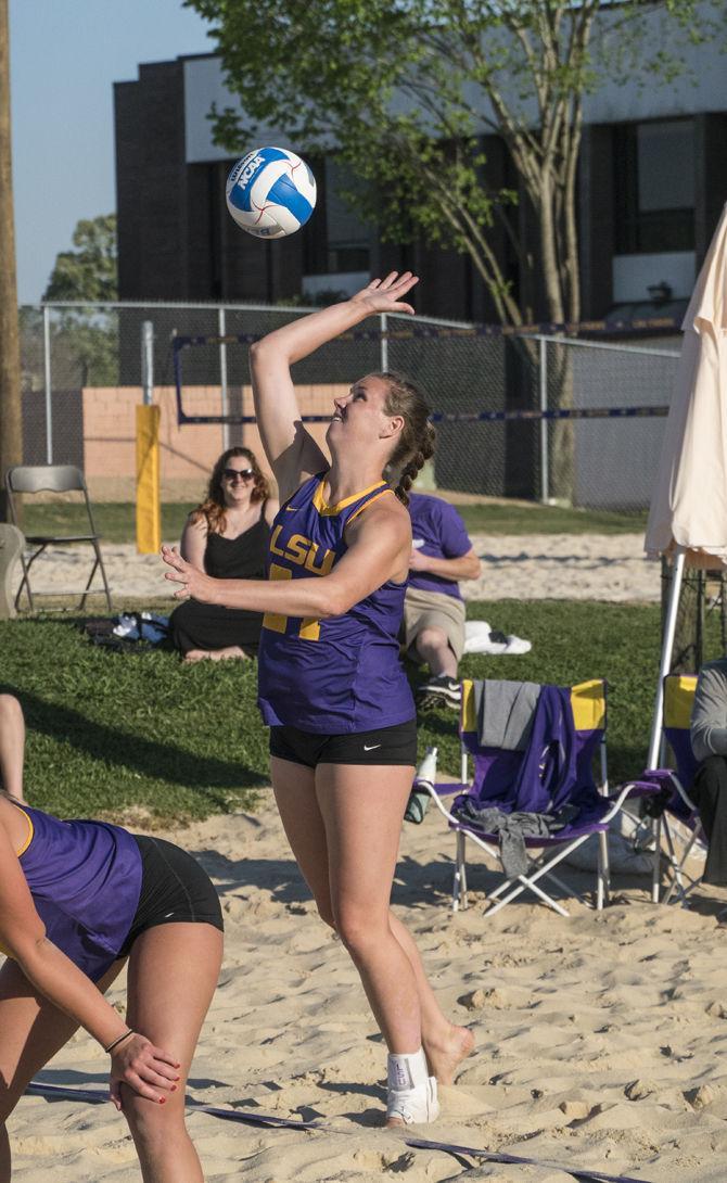 LSU senior Cati Leak (24) serves during the Tigers' 5-0 defeat against Florida St. on Saturday, Apr. 02, 2016 at Mango's Beach Volleyball Club.